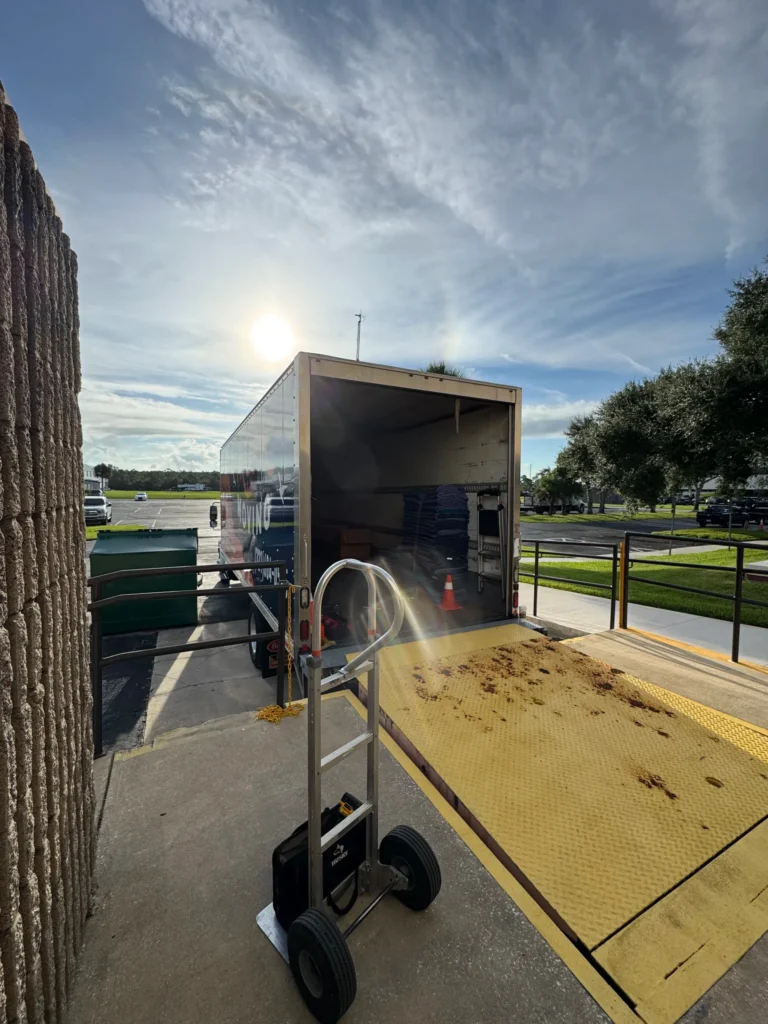 Tropic truck positioned at a loading ramp for project delivery